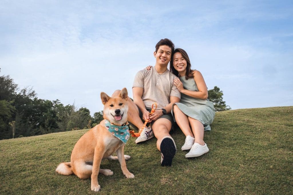 Couple on hill with dog