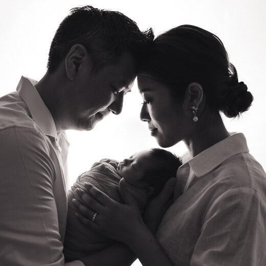 Newborn photography family of 3 B&W silhouette shot